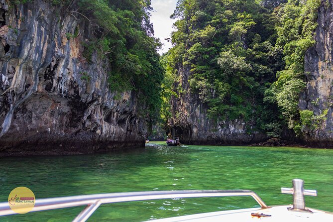 Hong Islands One Day Tour by Speed Boat from Ao Nang, Krabi - Ko Lao Lading: cliffs, shade, and a calmer bay feeling