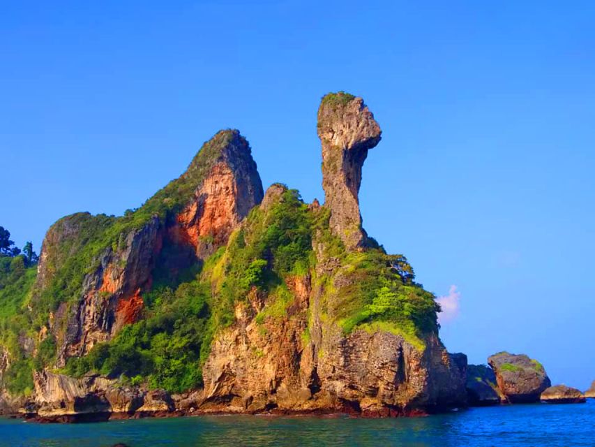 Krabi: 4 Islands Sunset Longtail Boat Tour with BBQ Dinner - Phra Nang Beach and the cave swim area near Railay