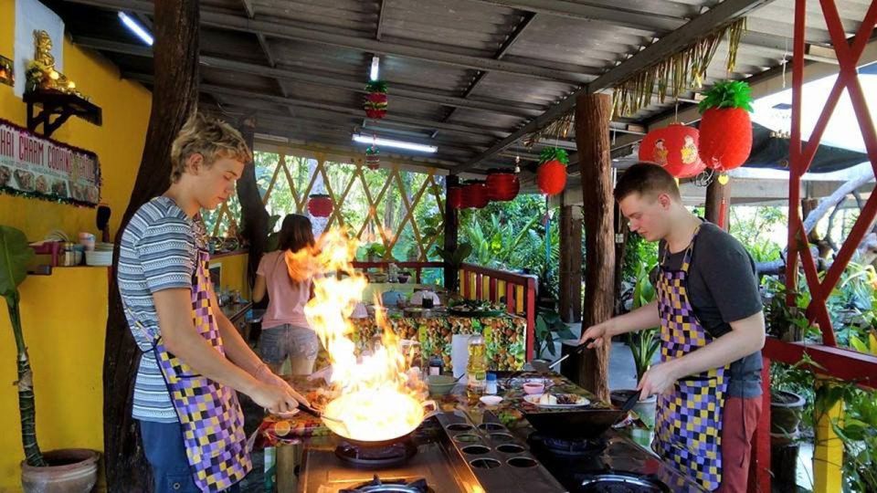 Krabi: Cooking Class at Thai Charm Cooking School with Meal - Soups, stir-fries, and salads: how your plate becomes a flavor lesson