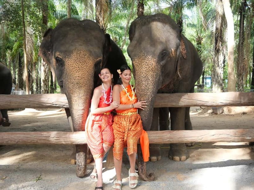 Krabi: Elephant Feeding Program with Traditional Thai Dress - Meet the mahouts and feed with safe, respectful boundaries