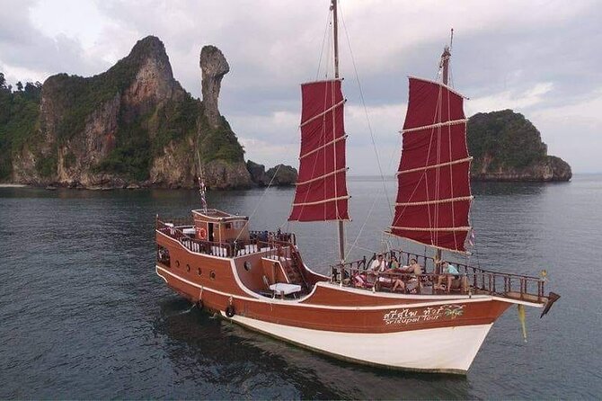 Sunset Dinner Cruise with night Swimming by Luxury Junk Boat - Cruising Past Railey’s Famous Spots (Before You Hit the Water)