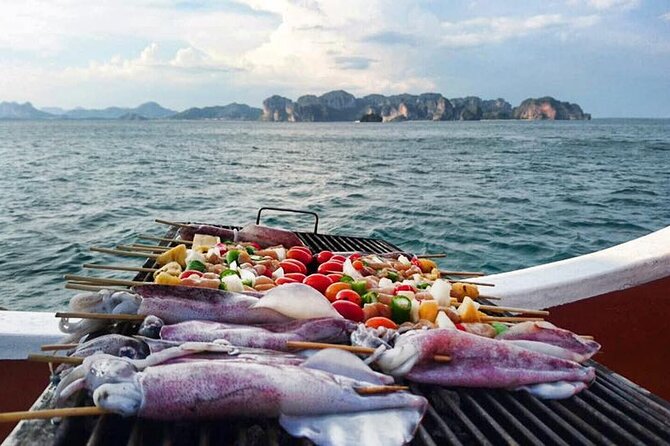 Sunset Dinner Cruise with night Swimming by Luxury Junk Boat - Poda Island: Your First Swim and Snorkel Window