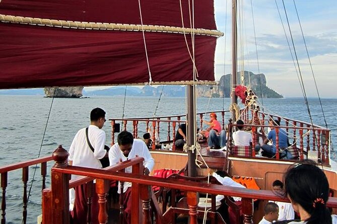Sunset Dinner Cruise with night Swimming by Luxury Junk Boat - The Crew and the On-Board Atmosphere You’ll Actually Feel